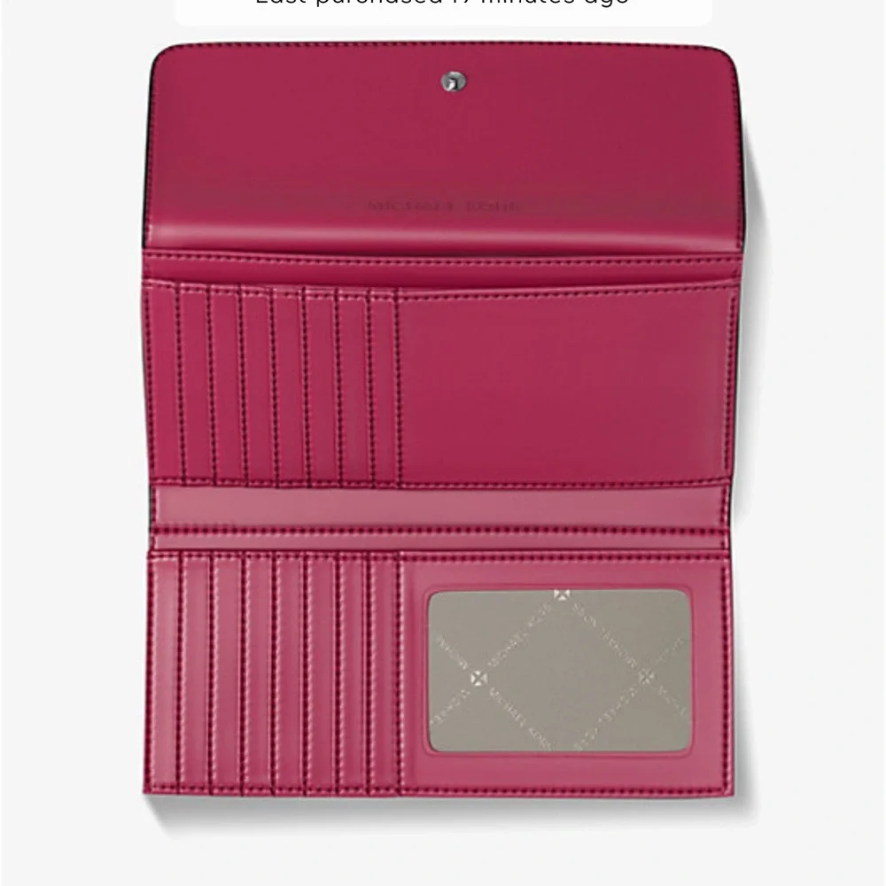 MICHAEL KORS Jet Set Travel Signature Logo Tri-Fold Wallet
DARK RASPBERRY MULTI - Picture 2 of 16